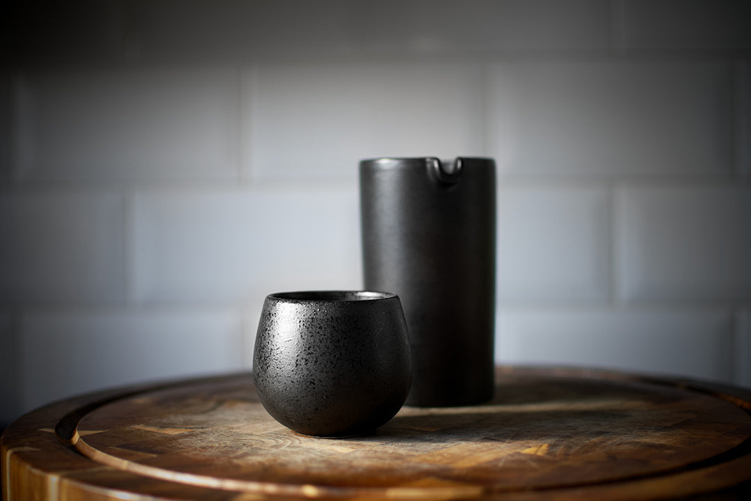 Why does coffee taste better when it's served in a ceramic mug?